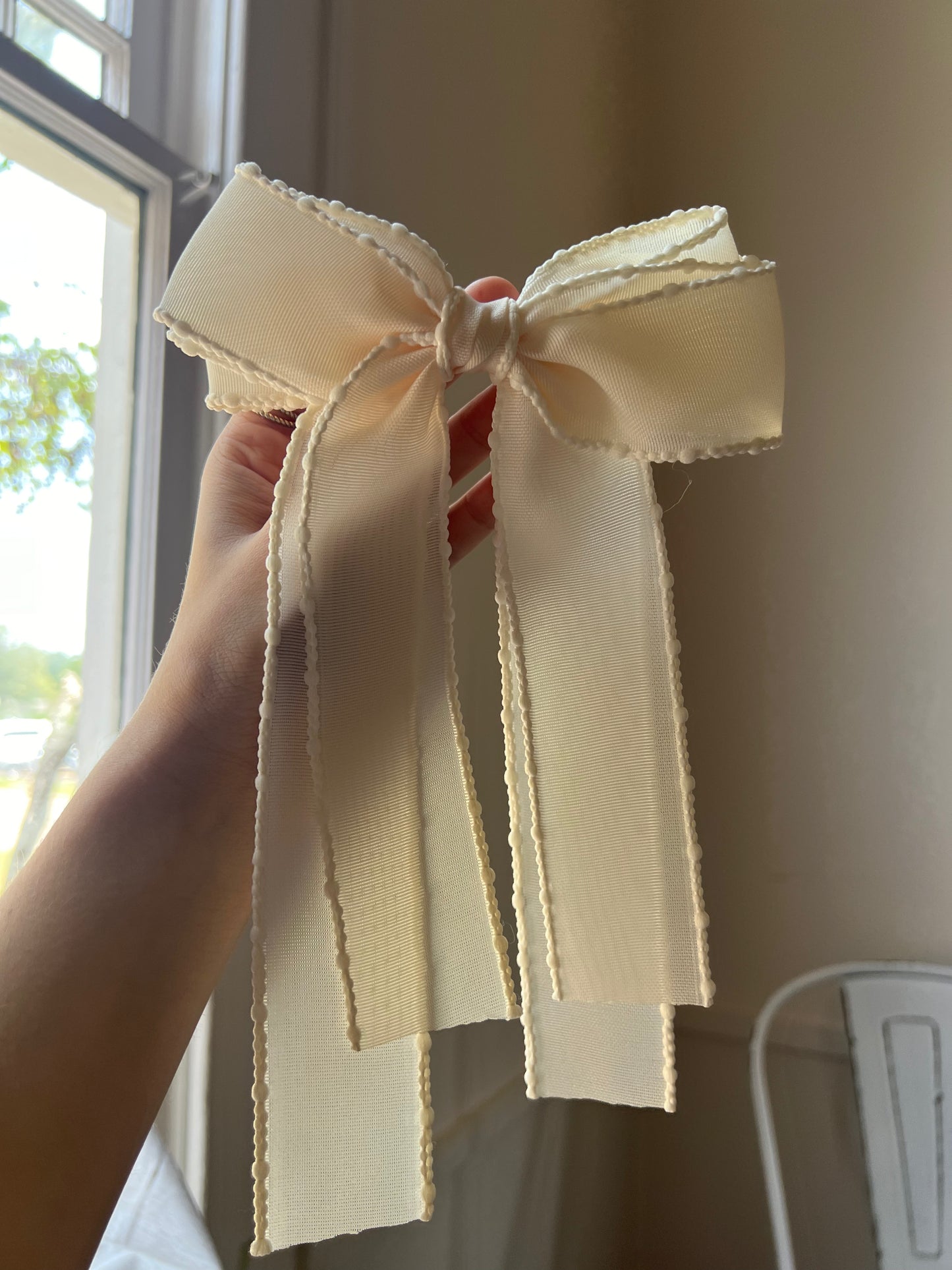 Ivory Aliese Bow